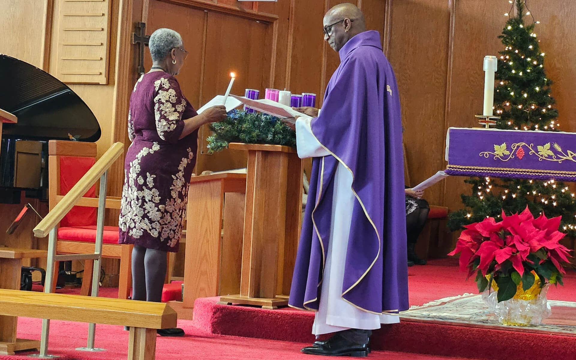 The fourth Sunday of Advent candle lighting.